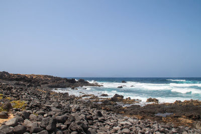 Black big rocks beach in lanzarote, canary islands, spain