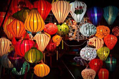 Illuminated lanterns hanging at night