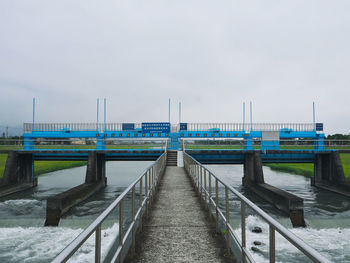 Pier over sea against sky