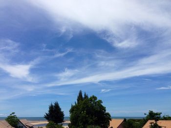 Scenic view of landscape against cloudy sky