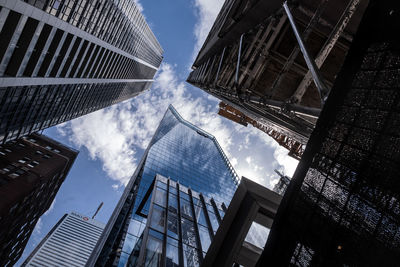 Low angle view of modern buildings against sky