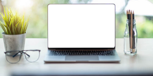 Close-up of laptop on table