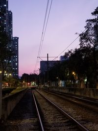 View of railway tracks at night