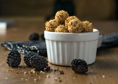 Close-up of fruits in bowl on table