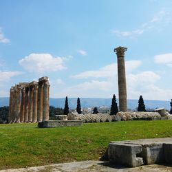 View of old ruins against cloudy sky