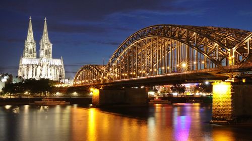 Bridge over river at night