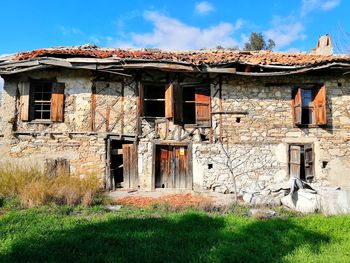 Abandoned building against sky