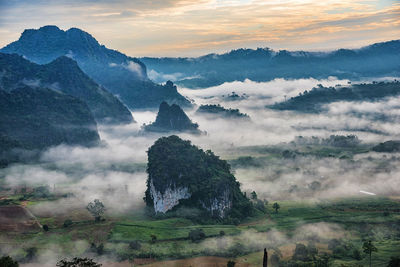 Scenic view of mountains against sky during sunset