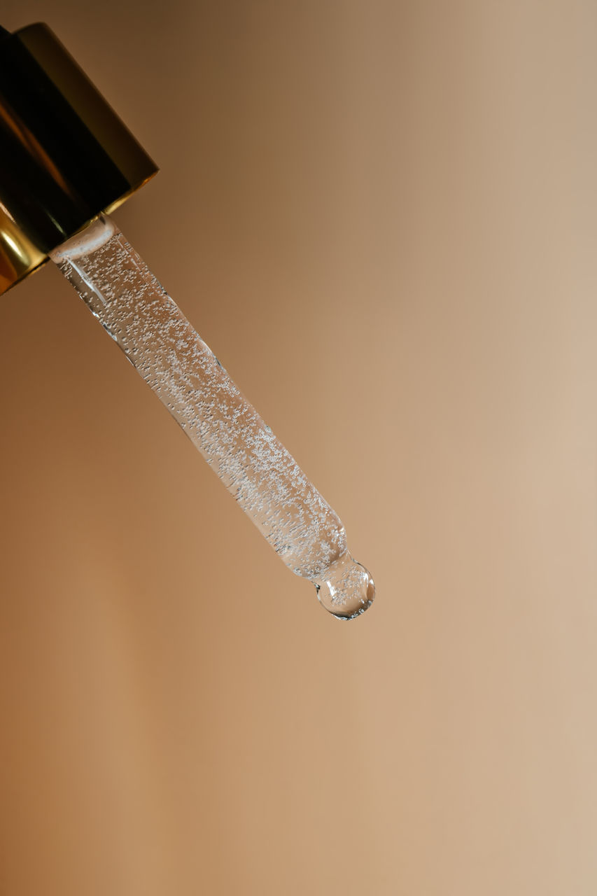 CLOSE-UP OF WATER DROPS ON ICE