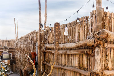 Close-up of wooden fence against sky