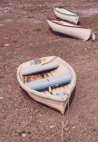 High angle view of boat moored on beach