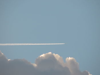 Low angle view of vapor trail in sky