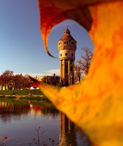 Tower amidst buildings against sky