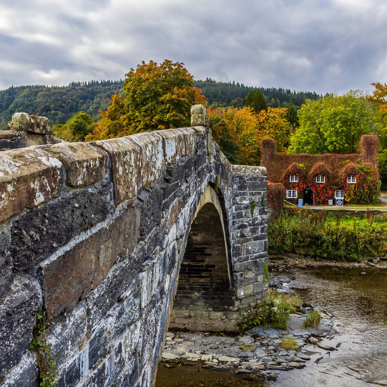 architecture, built structure, water, nature, cloud, sky, bridge, history, river, the past, travel destinations, plant, tree, rock, no people, travel, environment, tourism, ancient, ruins, landscape, waterway, outdoors, wall, stone material, arch, autumn, stone wall, scenics - nature, building exterior, land, day, old, rural area, building, transportation