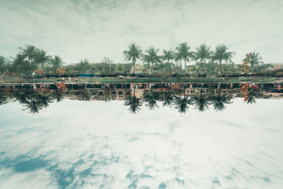 Hoian - scenic view of frozen lake against sky during winter