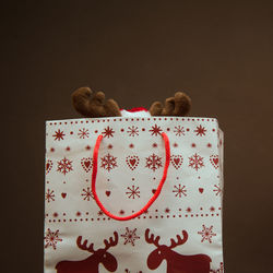 Close-up of stuffed toy against gray background