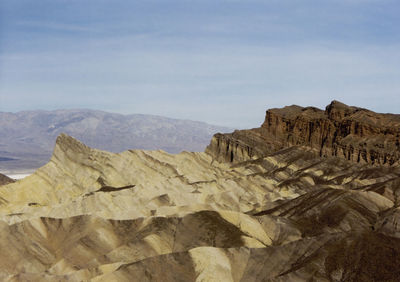 Scenic view of rocky mountains against sky