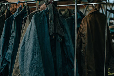 Close-up of clothes hanging on rack