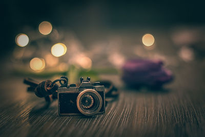 Close-up of camera decoration on table