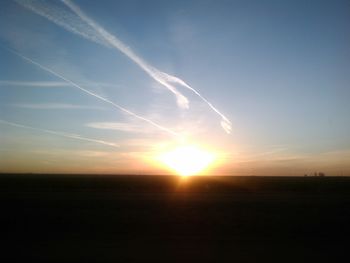 Scenic view of landscape at sunset