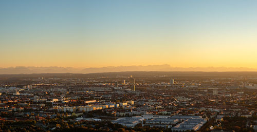 Munich panorama with alps in evening light and dusk