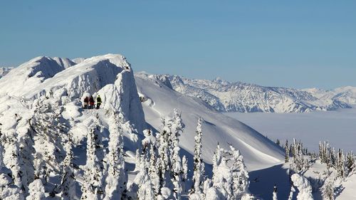 Scenic view of snow covered mountains