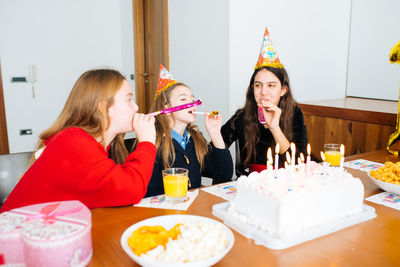 Girls enjoying birthday party at home