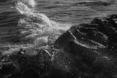 Waves splashing on rocks