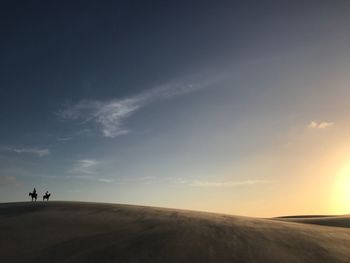 Road against sky during sunset