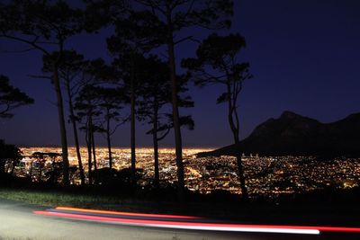 Scenic view of landscape against sky at night