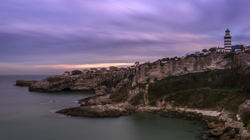 Scenic view of sea against cloudy sky