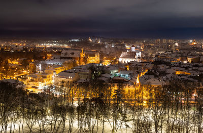 Aerial view of vilnius old town, lithuania in winter night with snow