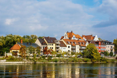 Town against cloudy sky