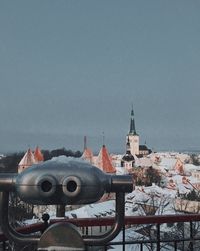 Church in city against clear sky