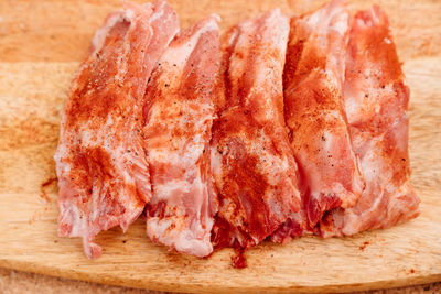 Close-up of meat on cutting board