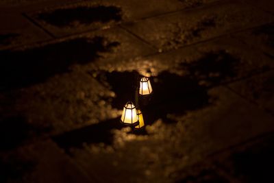 High angle view of illuminated lamp at night