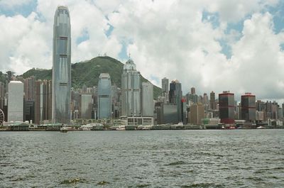 City by sea against sky