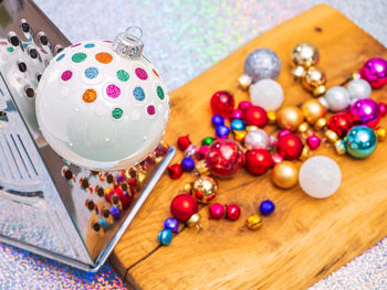 High angle view of multi colored candies on table