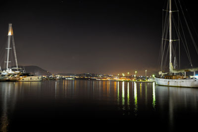 Boats moored at harbor