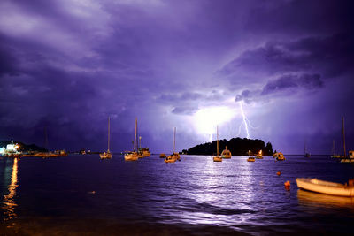 Panoramic view of sea against sky at night