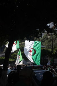 View of flags in city