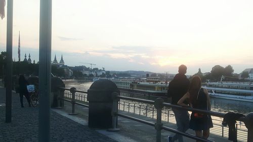 Rear view of man looking at cityscape