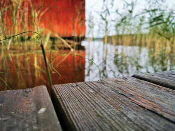 Close-up of wooden pier over lake