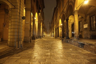 Empty walkway at night