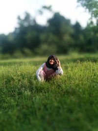 Portrait of woman on field