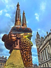 Low angle view of temple against blue sky