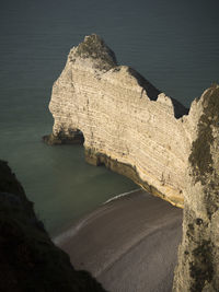 High angle view of rock formation at beach