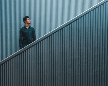 Portrait of a man on staircase