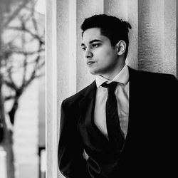 Portrait of young man looking away