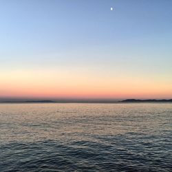 Scenic view of sea at sunset